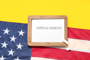 Chalkboard with word IMPEACH and USA flag on yellow background