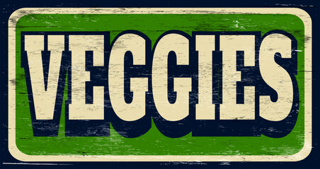 Aged and worn veggies sign on wood - 768389016