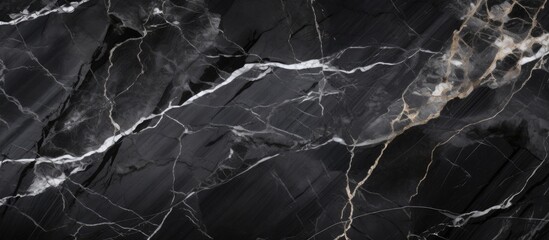 A detailed shot capturing the intricate pattern of black marble with striking white veins,...