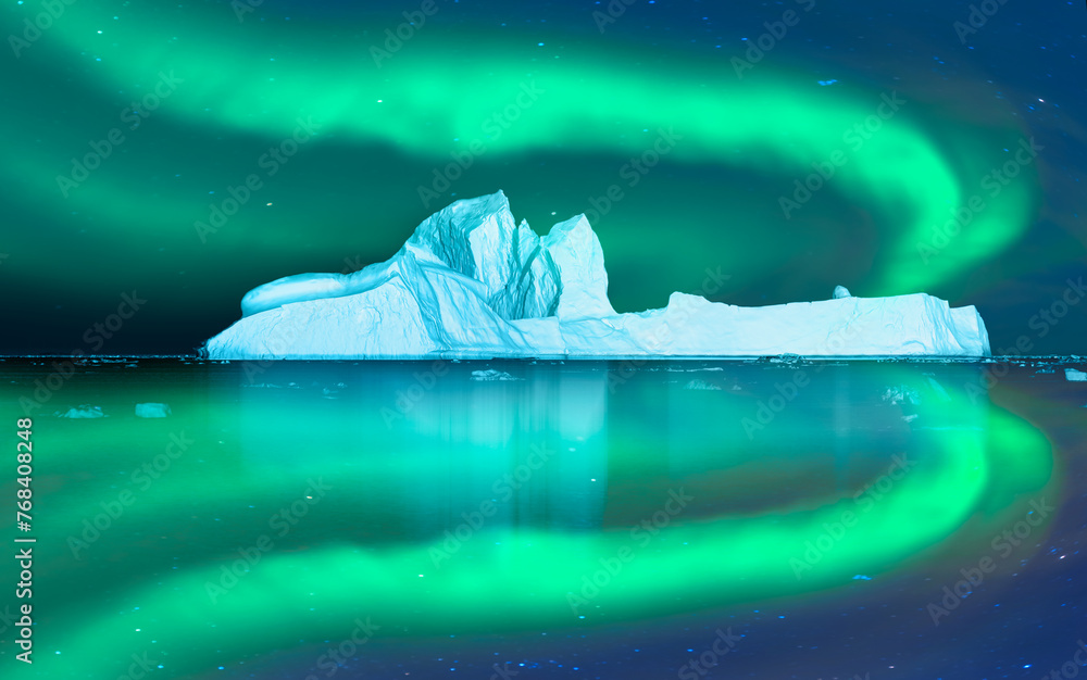 Wall mural iceberg floating in greenland fjord with aurora borealis - greenland