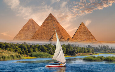 Beautiful Nile scenery with sailboat in the Nile on the way to The great Sphinx of Giza in Egypt  