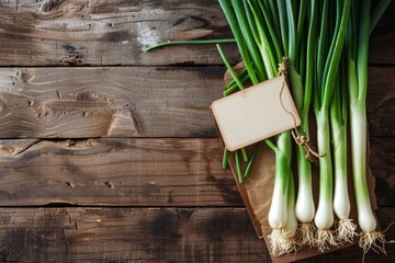 A bunch of fresh green onions arranged neatly on a wooden table - Powered by Adobe