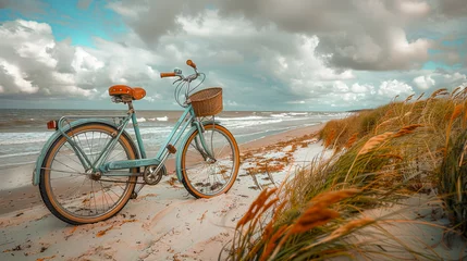Fototapeten On vacation with a bike. A parked bicycle on the beach by the sea. © senadesign