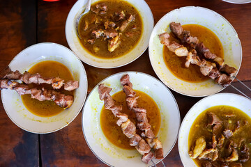 Sate Klathak, an uniq young goat or mutton satay dish with steel skewers that served with curry soup. Originally from Yogyakarta, Indonesia