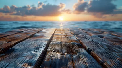 Foto op Canvas Tranquil Wooden Boardwalk Leading Into Serene Sunset or Sunrise Over the Ocean © Mayuree