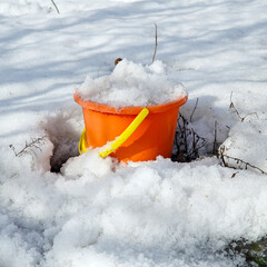 Melting snow in bucket