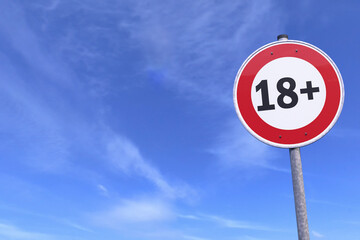 3d rendering of a traffic sign - 18 sign warning symbol - In the background a blue sky with clouds. 18 plus - censored - eighteen age older adult content. - 768432032
