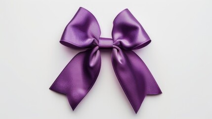 Purple gift bow on white background. Gift wrapping ribbon