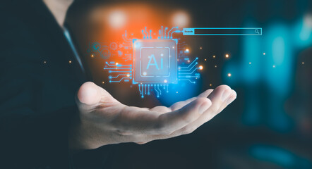 Businessman is showing concept of future technology and internet connection network with AI as controller. A graphic floated in the air on his hand. Data center network concept.