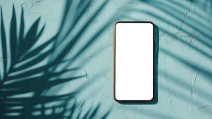 Smartphone with a transparent screen with the shadow of palm leaves isolated on a light blue background.