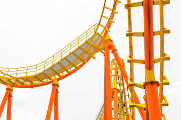 Detail image of a roller coaster track on white background