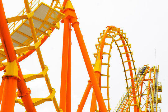 Detail image of a roller coaster track on white background