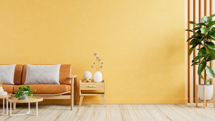 Living room wall mockup with leather sofa and decor on yellow wall background - 768484853