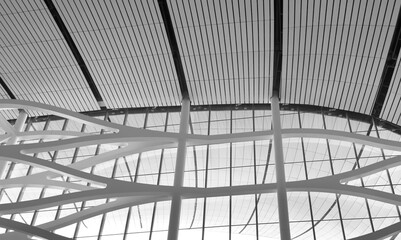 Lights and ventilation system in long line on ceiling of the industrial building. Exhibition Hall. Ceiling factory construction..