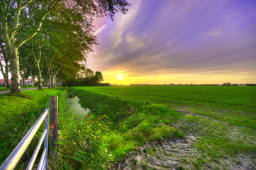 Sunset in the country in Holland. - obrazy, fototapety, plakaty