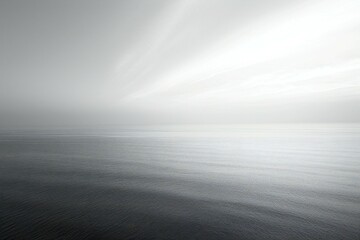 Dramatic seascape with fog in the sky and sea - obrazy, fototapety, plakaty