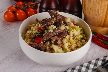 Traditional couscous with beef and vegetables