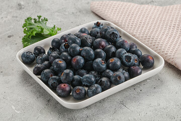 Sweet ripe blueberry on the bowl