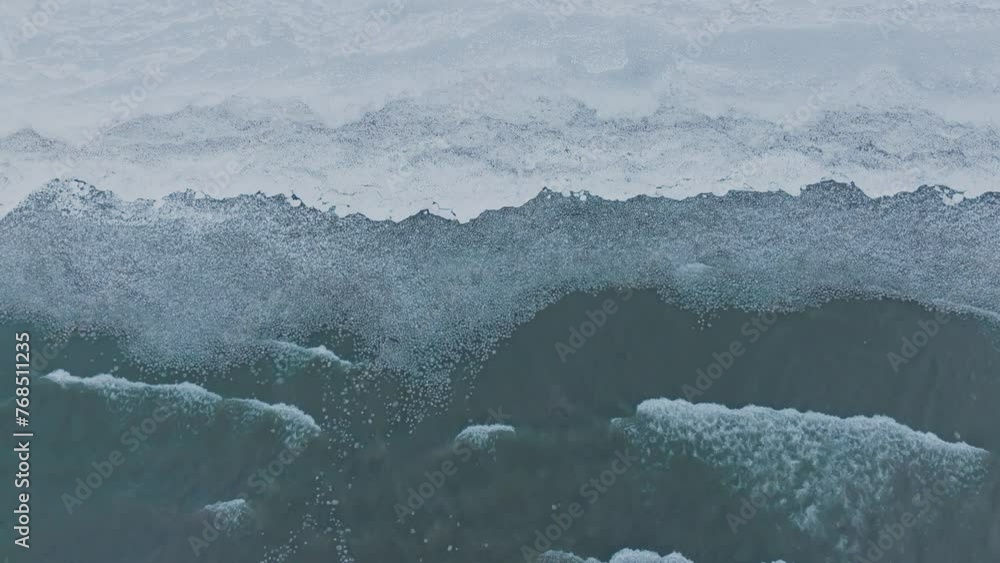 Poster close-up of a frozen lake with delicate ice patterns and soft light reflection