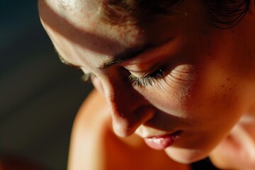 closeup of a dancers face focused deeply in a movement