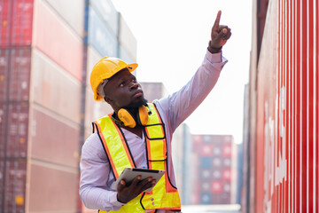 African logistic engineer man worker or foreman working with container at container site	 - 768518668