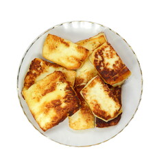 Grilled cheese in a plate isolated. Grilled slices of halloumi cheese isolated on white background. 