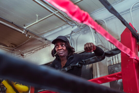 Coach watching girls in ring