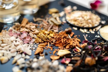 closeup of a perfumers palette with assorted raw ingredients - obrazy, fototapety, plakaty