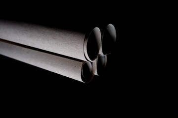 roll of wrap paper isolated on black background, roll of paper for food wrapping
