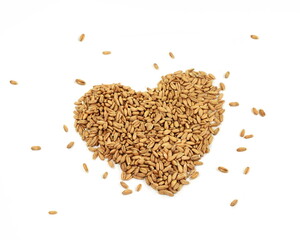 spelt grain in the shape of a heart  isolated on white background