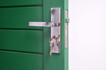 green door with lock