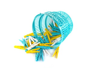 plastic basket full of colorful clothespins
