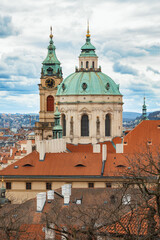 Panorama of old historic town Prague in Czech Praha, view from castle hill in sunny day, in front Church of Saint Nicholas. Central Bohemia, Czech Republic - 768533828