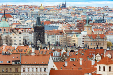 Panorama of old historic town Prague in Czech Praha, view from castle hill to famous Charles bridge in sunny day, Central Bohemia, Czech Republic