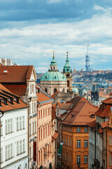 Panorama of old historic town Prague in Czech Praha, view from castle hill in sunny day, in front Church of Saint Nicholas. Central Bohemia, Czech Republic - 768534032