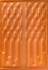 brown leather background and texture as a pattern for the interior car or a sofa or wall covering