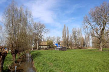 Obraz premium Old farm Geertruidahoeve which may not be demolished by statue National monument is in Nieuwerkerk aan den IJssel