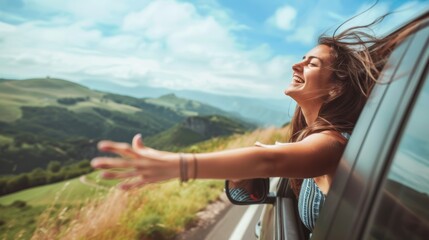.Happy woman stretches her arms while sticking out car window. Lifestyle, travel, tourism, nature, car, person, travel, females, summer, happy - obrazy, fototapety, plakaty