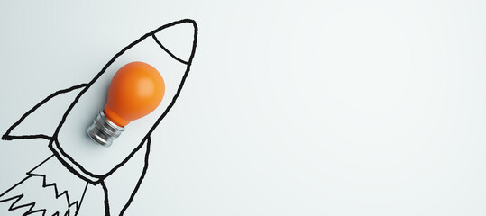 Creative spaceship sketch and orange lamp on wide white background with mock up place. Start up,...