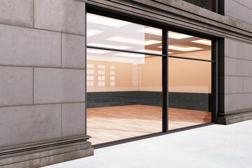 An empty storefront with a large window display, modern design, on a building facade, set in a light outdoor urban environment. 3D Rendering