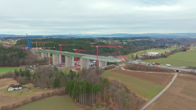 Aerial View Of New Highway Bridge Under Construction In Daytime.