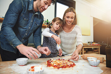 Learning, smile and family baking pizza in kitchen together, bonding and happy in home. Food,...