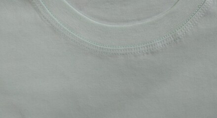 close-up of a white t-shirt with stitching at the neck