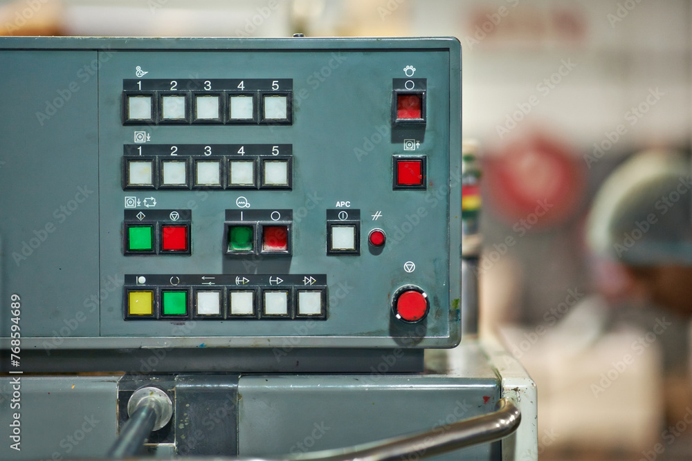 Poster factory, production and technology of machine closeup on system at manufacturing warehouse. industri