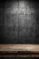 Old wood table with blurred concrete block wall in dark room background