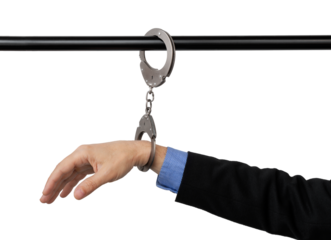 businessman's hand handcuffed to a pipe, anti-corruption concept, cut out on isolated background.