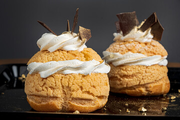 tasty pastry with whipped cream