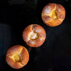 fresh brioche on the black background