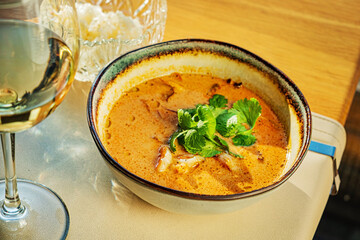cream soup with curry on table