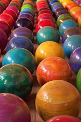 Fototapeta na wymiar Colorful Bowling Balls Lined Up